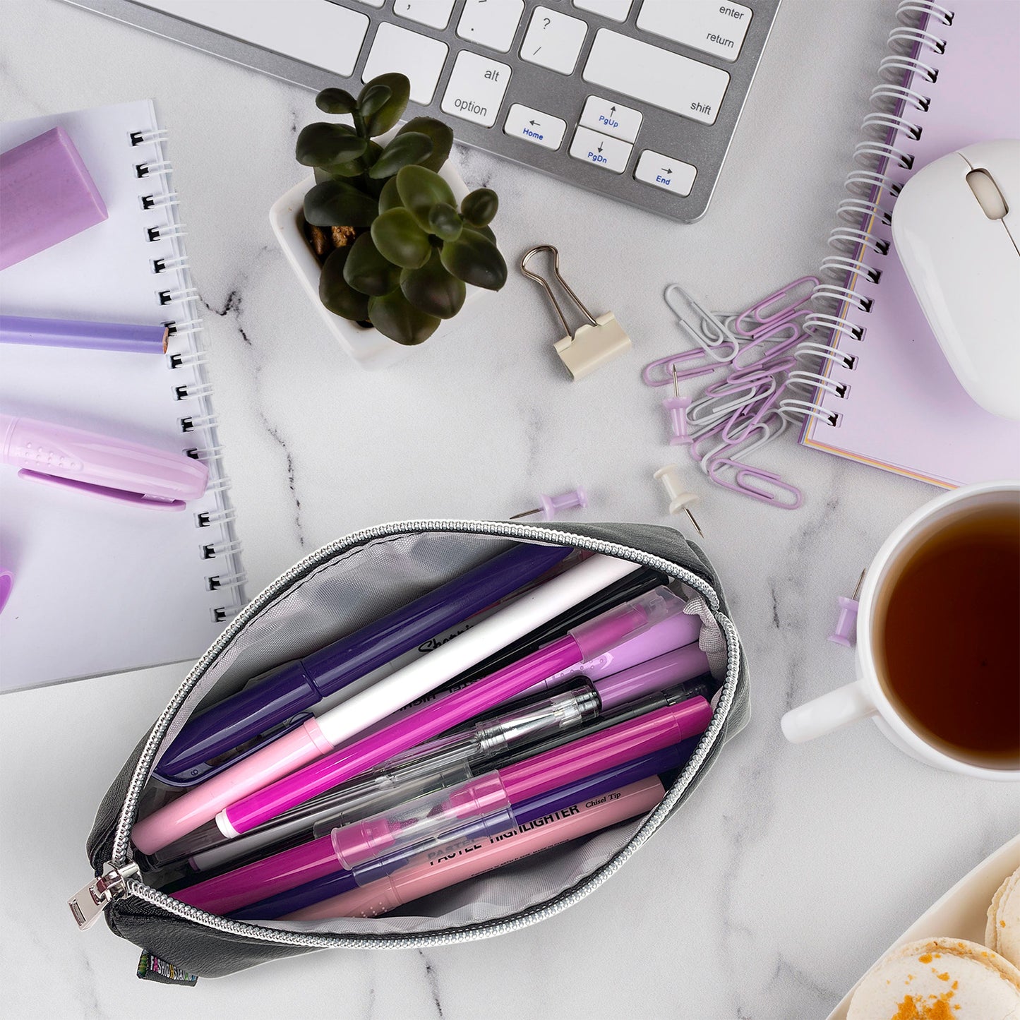 slim black pencil case for girls for school filled with pens and pencils